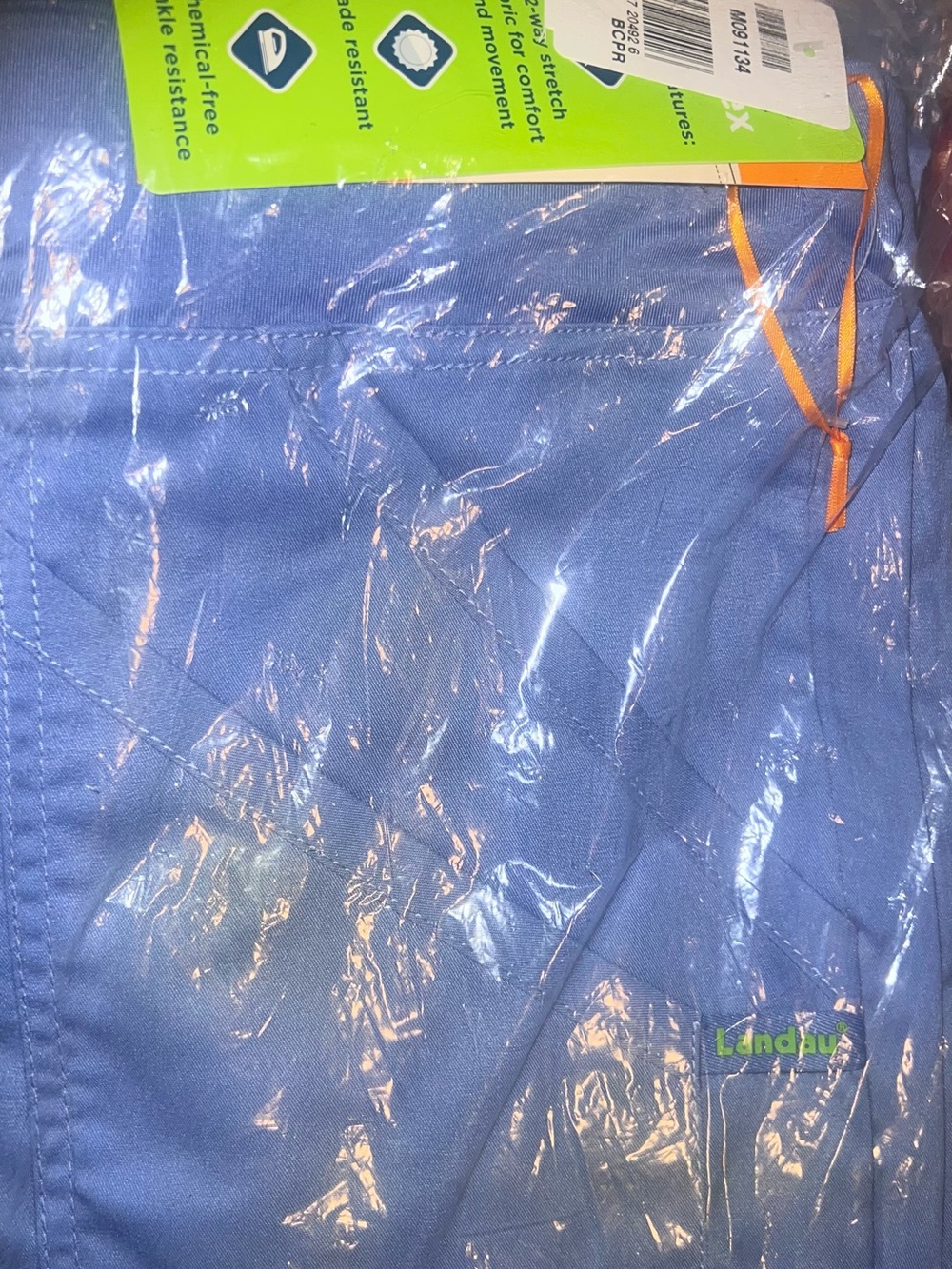 Landau Women's Hybrid Scrub Shorts in Light Blue with Orange Accent
